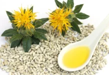 زيت العصفر (القرطم) | Safflower Oil زيت العصفر الطبيعي المستخرج من بذور القرطم مع الزهور الصفراء.